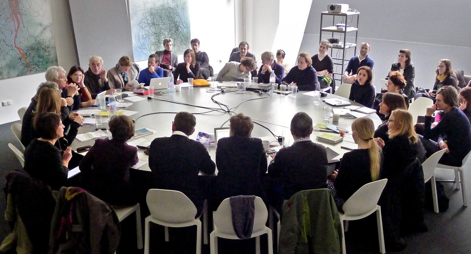 Mediators sitting around a large round table at an international meeting of the New Patrons Antibes/France