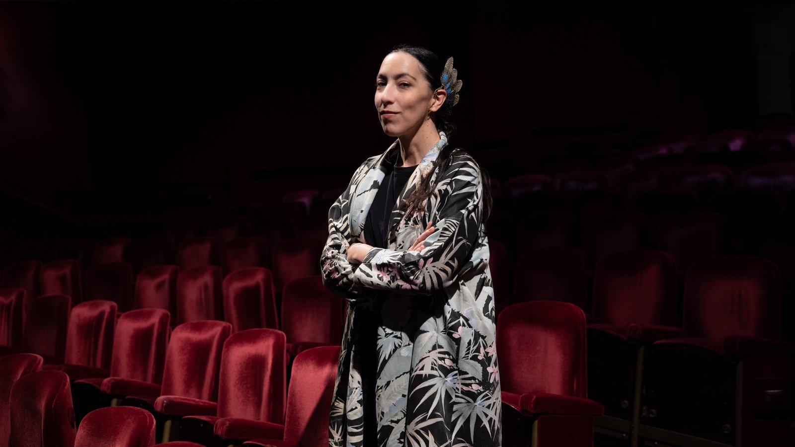 Portrait of a person, standing in a theater 
