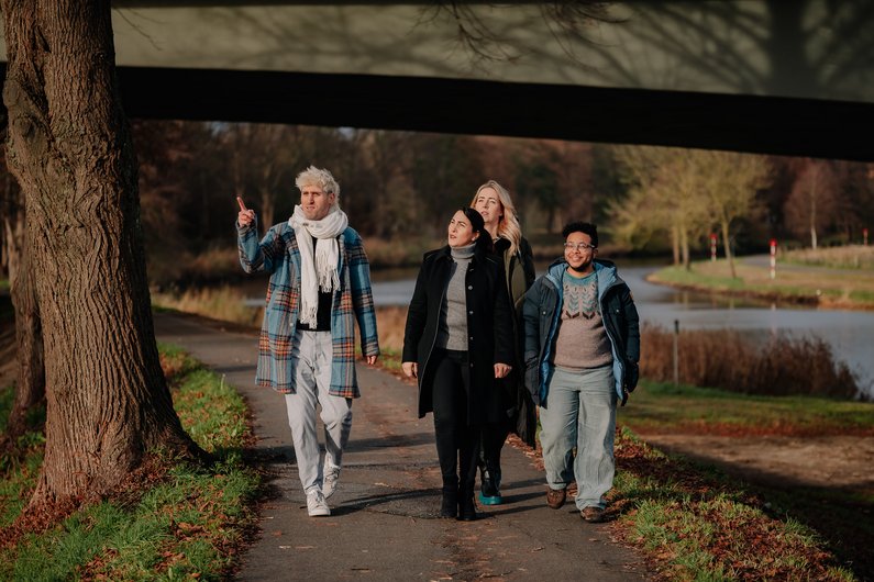 People walking in the forest, autumn